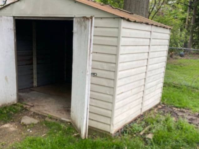 Shed teardown in Backyard, before